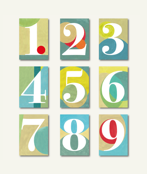 Bundle of 9 numbered DIN A6 notebooks made from 100% recycled paper, eco-friendly and hand-bound, front view.