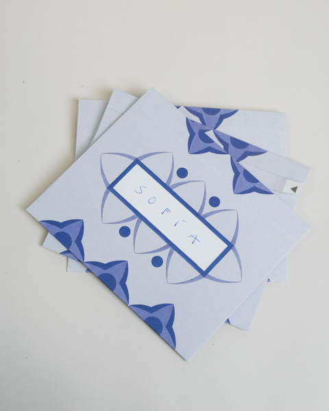 Set of three letterfolds featuring a green stripes design, displayed together in a stacked spread.