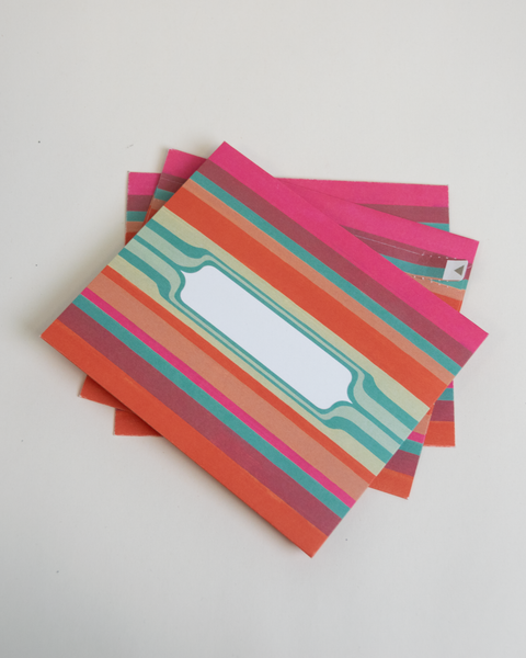 Set of three letterfolds featuring a green stripes design, displayed together in a stacked spread.