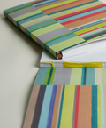 Eco-friendly notebook both side  stripes design, DIN A5 recycled paper cover, zoom in handbound detail, handmade in Berlin