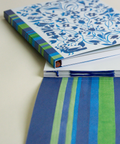 Eco-friendly notebook garden and stripes in blue design, DIN A5 recycled paper cover, zoom in handbound detail, handmade in Berlin