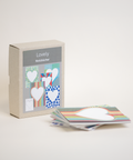 Bundle box of 6 DIN A6 notebooks made from 100% recycled paper, eco-friendly and hand-bound, front view.