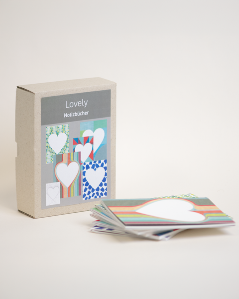 Bundle box of 6 DIN A6 notebooks made from 100% recycled paper, eco-friendly and hand-bound, front view.
