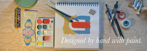 Artist’s sketchbook with floral design, paint brushes and tools – handmade eco stationery designs from Berlin.