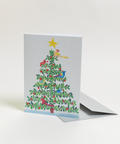 Eco-friendly Christmas in paradise-Tree design  greeting card, angled view, printed in Berlin on recycled paper.
