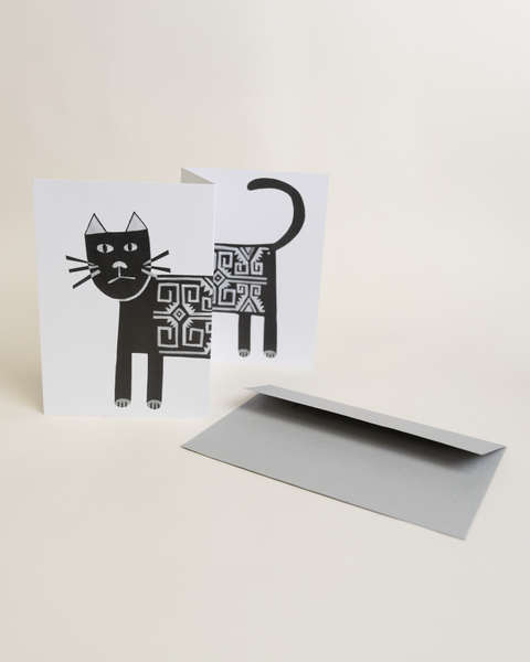 Eco-friendly cat greeting card, angled view, printed in Berlin on recycled paper.