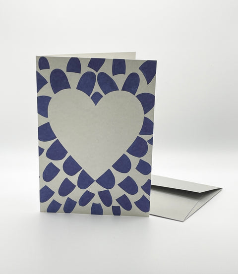 Eco-friendly lovely on blue petals greeting card, 3/4 angled view, printed in Berlin on recycled paper