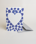Eco-friendly lovely on blue petals greeting card, 3/4 angled view, printed in Berlin on recycled paper