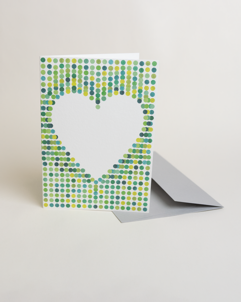 Eco-friendly lovely on green spots greeting card, 3/4 angled view, printed in Berlin on recycled paper