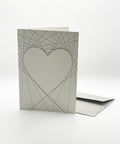 Eco-friendly lovely on lines greeting card, 3/4 angled view, printed in Berlin on recycled paper