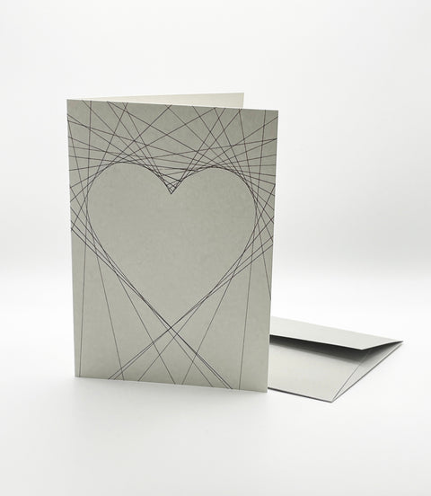 Eco-friendly lovely on lines greeting card, 3/4 angled view, printed in Berlin on recycled paper