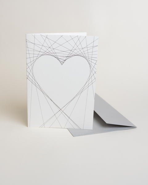 Eco-friendly lovely on lines greeting card, 3/4 angled view, printed in Berlin on recycled paper