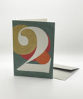 Eco-friendly number 2 greeting card, 3/4 angled view, printed in Berlin on recycled paper