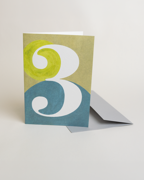 Eco-friendly number 3 greeting card, 3/4 angled view, printed in Berlin on recycled paper