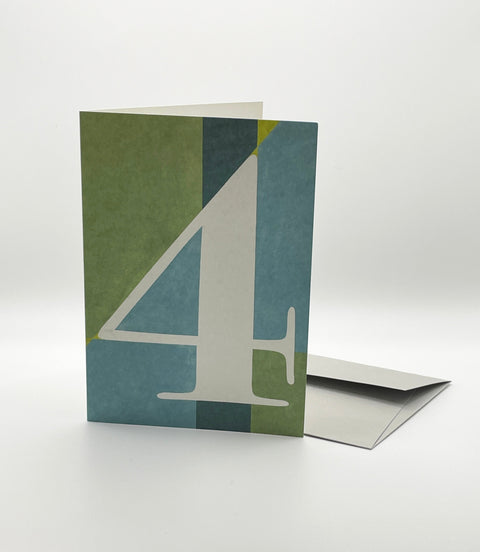 Eco-friendly number 4 greeting card, 3/4 angled view, printed in Berlin on recycled paper