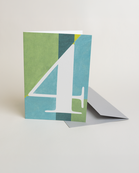 Eco-friendly number 4 greeting card, 3/4 angled view, printed in Berlin on recycled paper