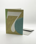 Eco-friendly number 7 greeting card, 3/4 angled view, printed in Berlin on recycled paper