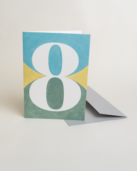 Eco-friendly number 8 greeting card, 3/4 angled view, printed in Berlin on recycled paper