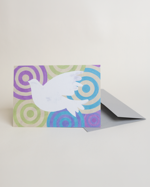 Eco-friendly Peace beige greeting card, angled view, printed in Berlin on recycled paper.