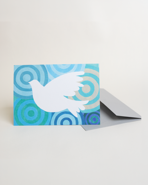 Eco-friendly Peace blue greeting card, angled view, printed in Berlin on recycled paper.