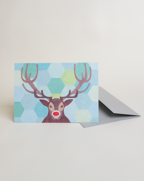 Eco-friendly Rudolph greeting card, angled view, printed in Berlin on recycled paper.