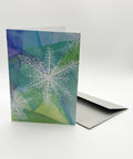 Eco-friendly X-mas Day snow greeting card, 3/4 angled view, printed in Berlin on recycled paper