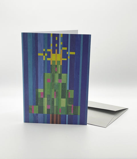 Eco-friendly X-mas tree in stripes snow greeting card, 3/4 angled view, printed in Berlin on recycled paper