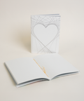 Eco-friendly notebook Lovely on lines, angled view, DIN A6 recycled paper cover, handmade in Berlin