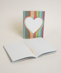 Eco-friendly notebook Lovely on stripes, angled view, DIN A6 recycled paper cover, handmade in Berlin