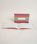 Eco-friendly notebook Mexican Stripes, angled view, DIN A6 recycled paper cover, handmade in Berlin
