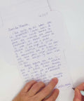 Video of Mexican stripes letterfold being folded into an envelope, eco stationery