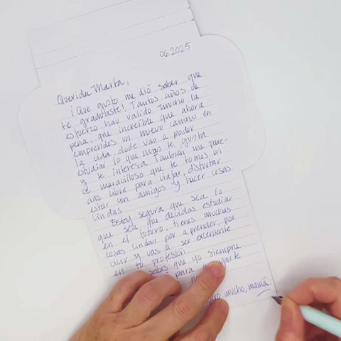 Video of Mexican stripes letterfold being folded into an envelope, eco stationery