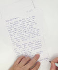 Video of Mexican stripes letterfold being folded into an envelope, eco stationery