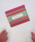 Video of Mexican stripes letterfold being opened to reveal inside, handmade stationery