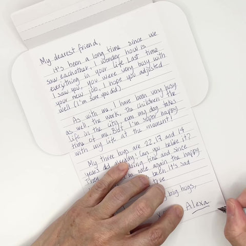 Video of Hearts letterfold being folded into an envelope, eco stationery