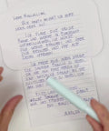 Video of Blue jacquard letterfold being folded into an envelope, eco stationery