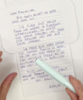 Video of Blue jacquard letterfold being folded into an envelope, eco stationery