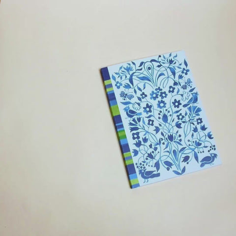 Video flip-through of garden and stripes in blue A5 notebook, eco stationery made from 100% recycled paper in Berlin