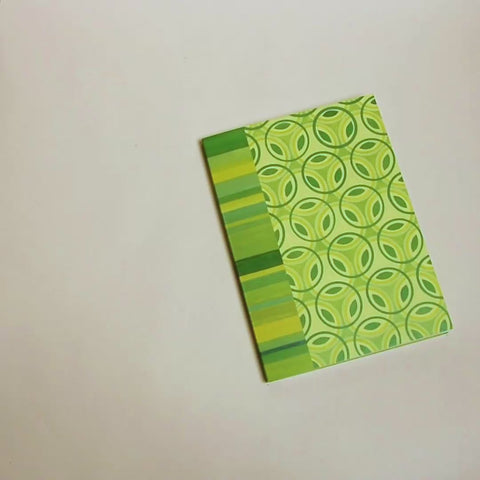Video flip-through of Stained-glass flowers and stripes A5 notebook, eco stationery made from 100% recycled paper in Berlin